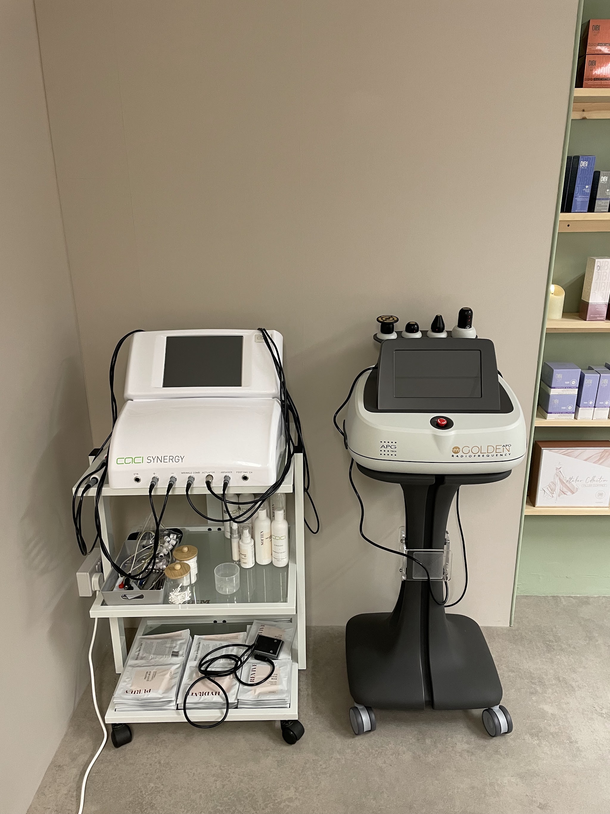 The CACI Synergy unit beside the Golden radio frequency machine