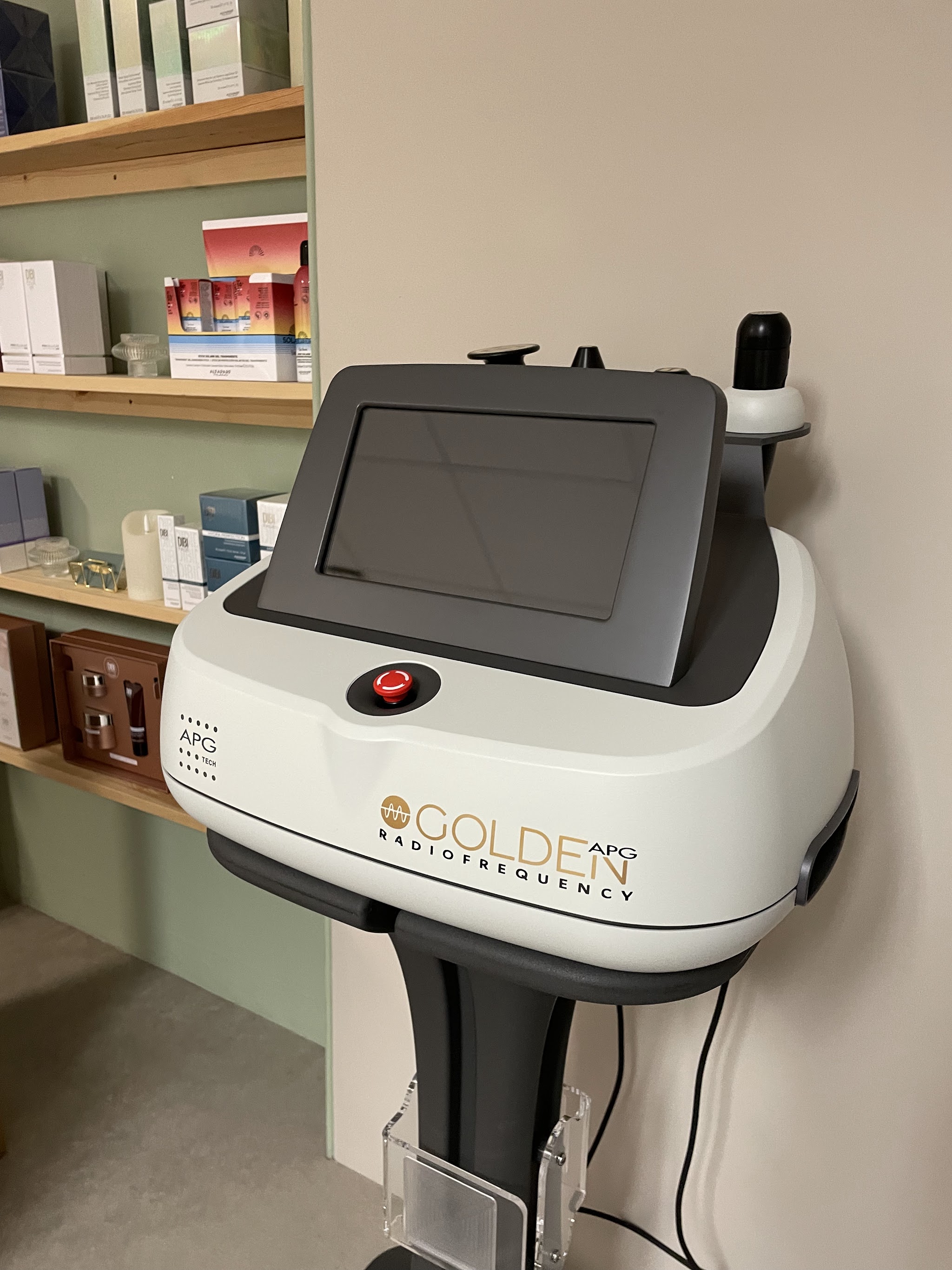 The Golden radio frequency machine in front of the product shelves